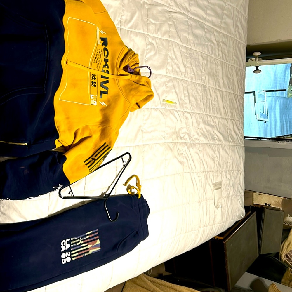 Size large Rock Revival sweat shirt and medium pants